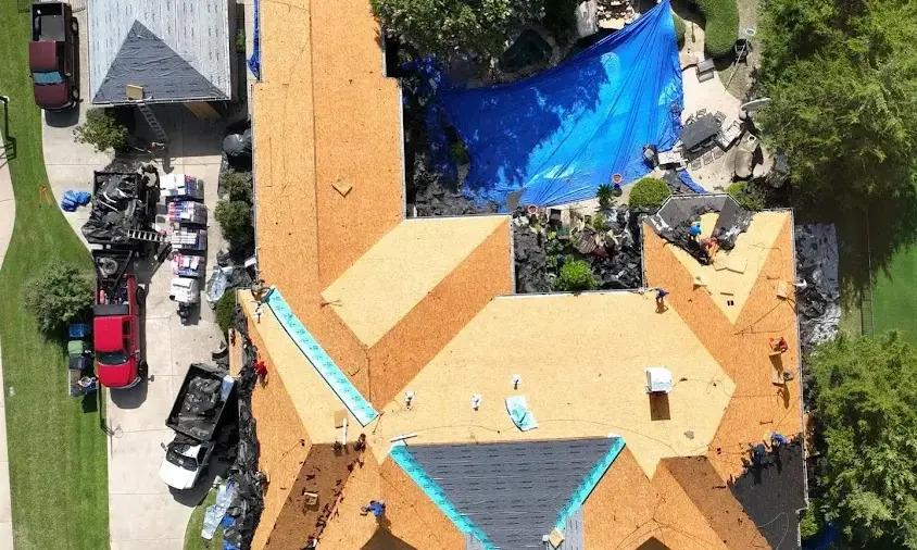 Professional Storm Damage Roof Repair being performed in New Braunfels